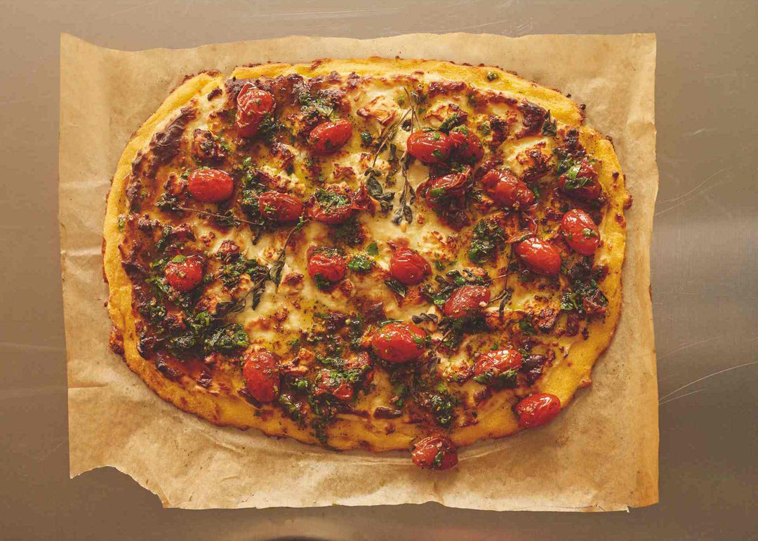 Ottolenghi Test Kitchen’s Baked Polenta with Feta, Béchamel and Za’atar Tomatoes
