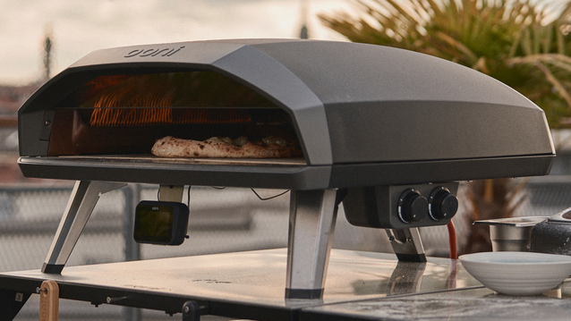 angled view of Koda 2 max with pizza cooking