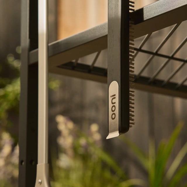 pizza oven brush hanging on modular table
