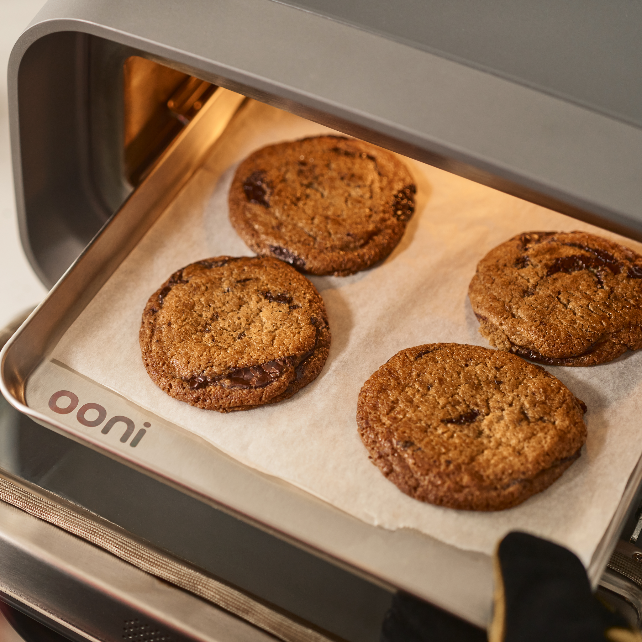 cooking baking in ooni volt 2 electric pizza oven. on the ooni sheet pan and rack for ooni volt 2 